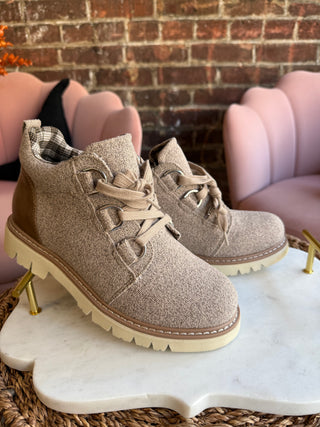 Beige boots with white soles. Corkys Campfire boots