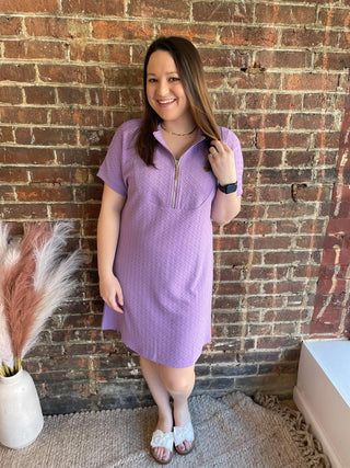 Olivia in purple dress