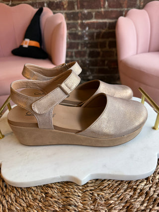 Rose gold mary-jane type shoes. Corkys All In